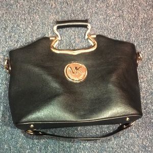 Black and gold Michael Kors bag